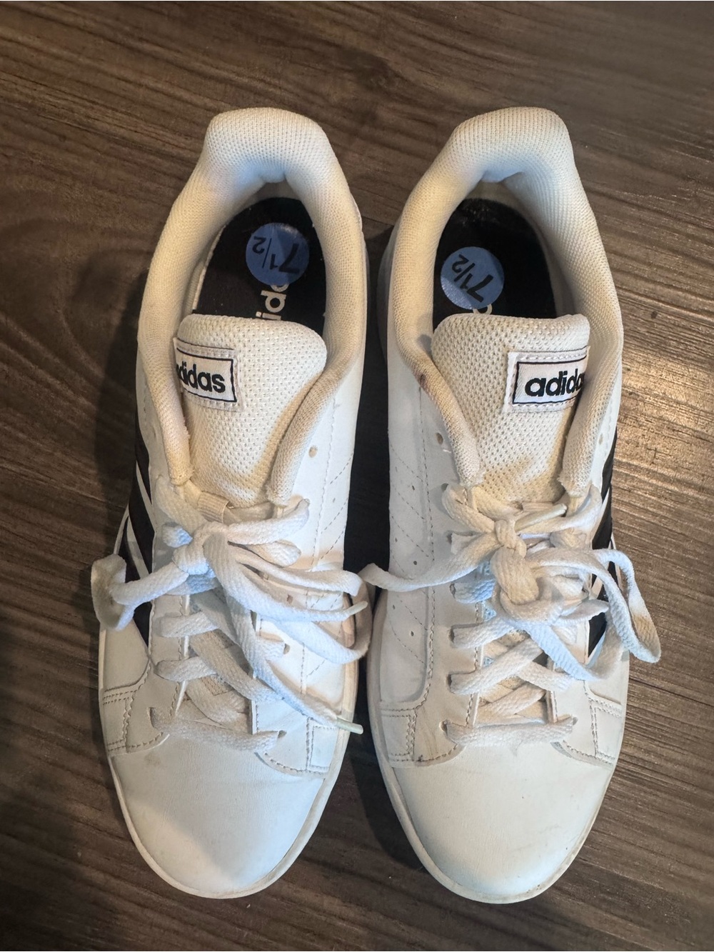 Adidas Women’s White Sneakers with Black Stripes